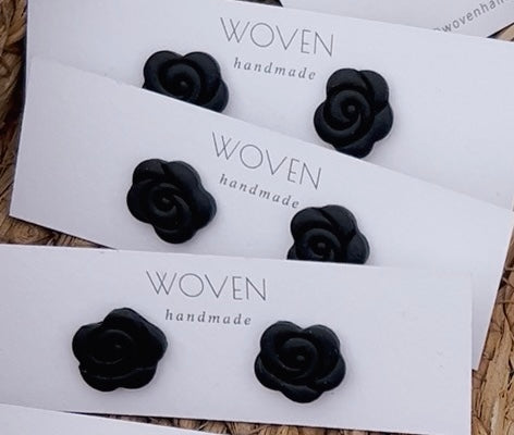 Black flower stud earrings