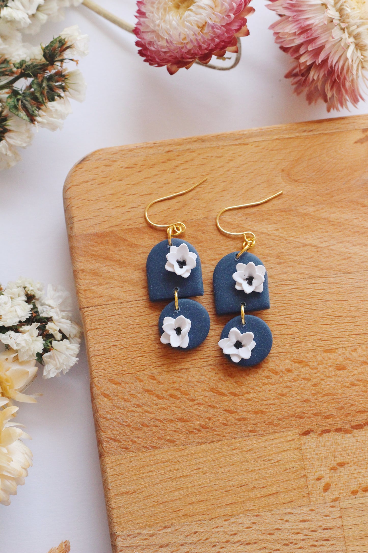 Blue and white floral earrings 