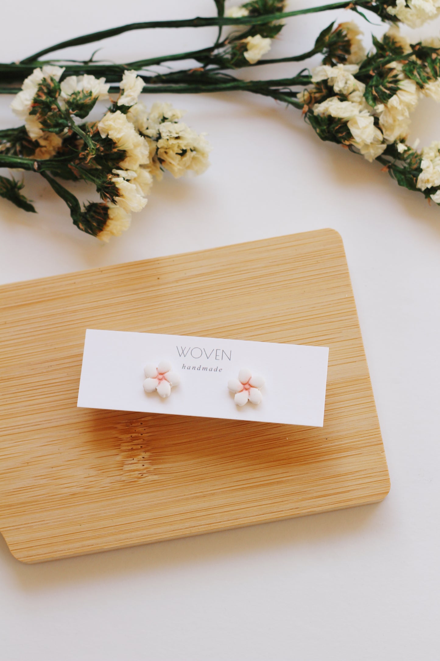 White and pink lotus flower stud earrings
