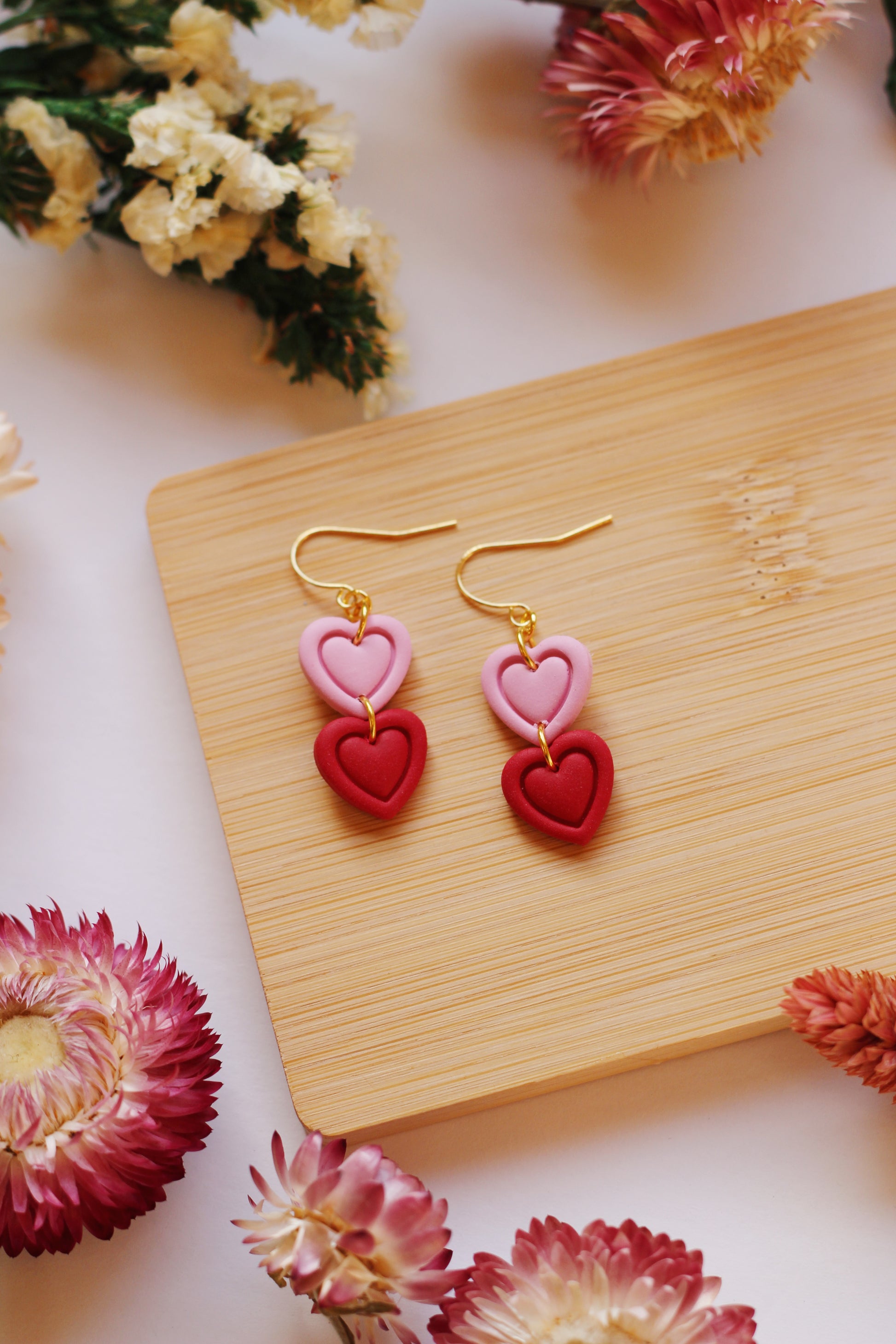 Pink and red heart dangle earrings