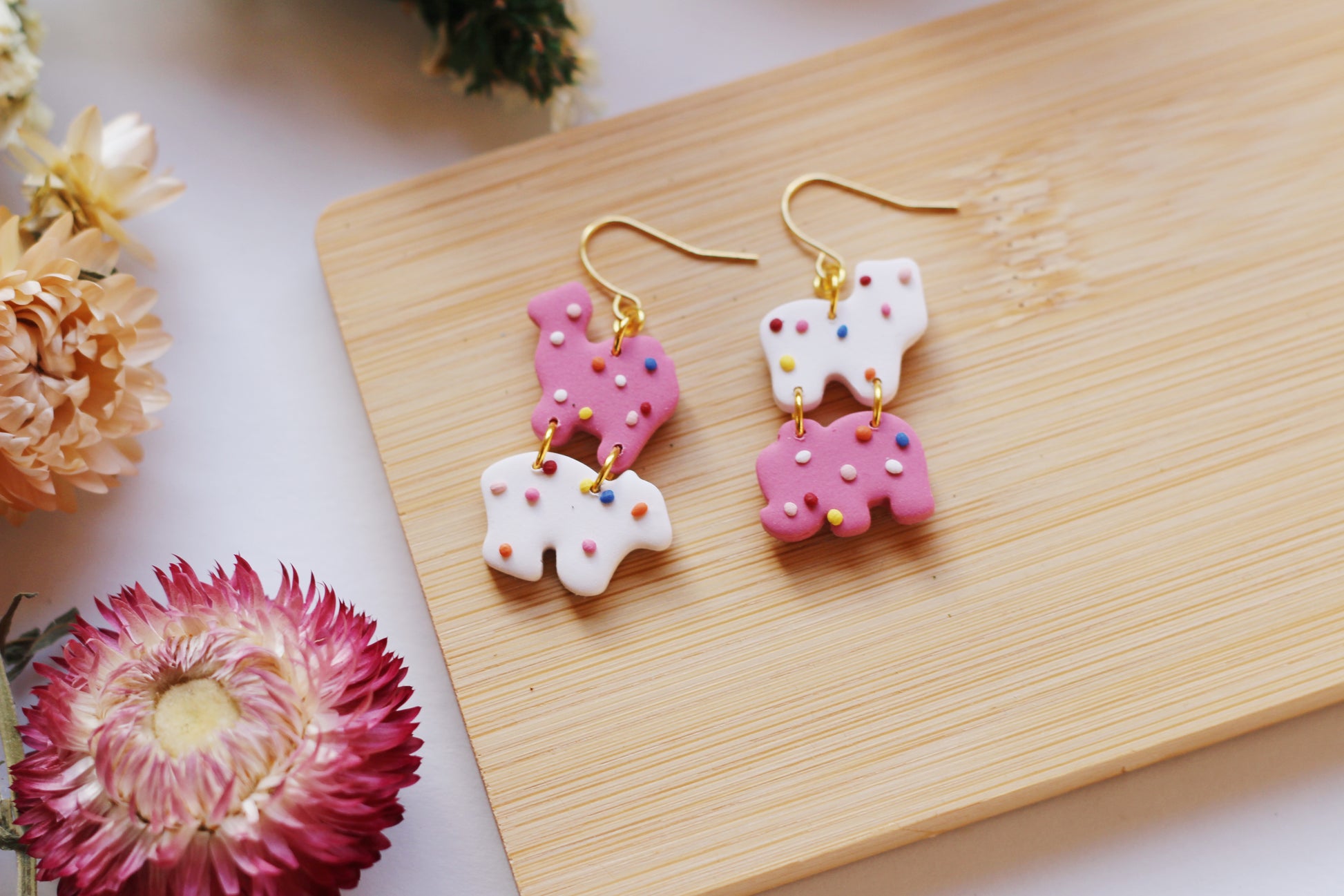 Animal shaped cookie earrings with sprinkles and gold hooks
