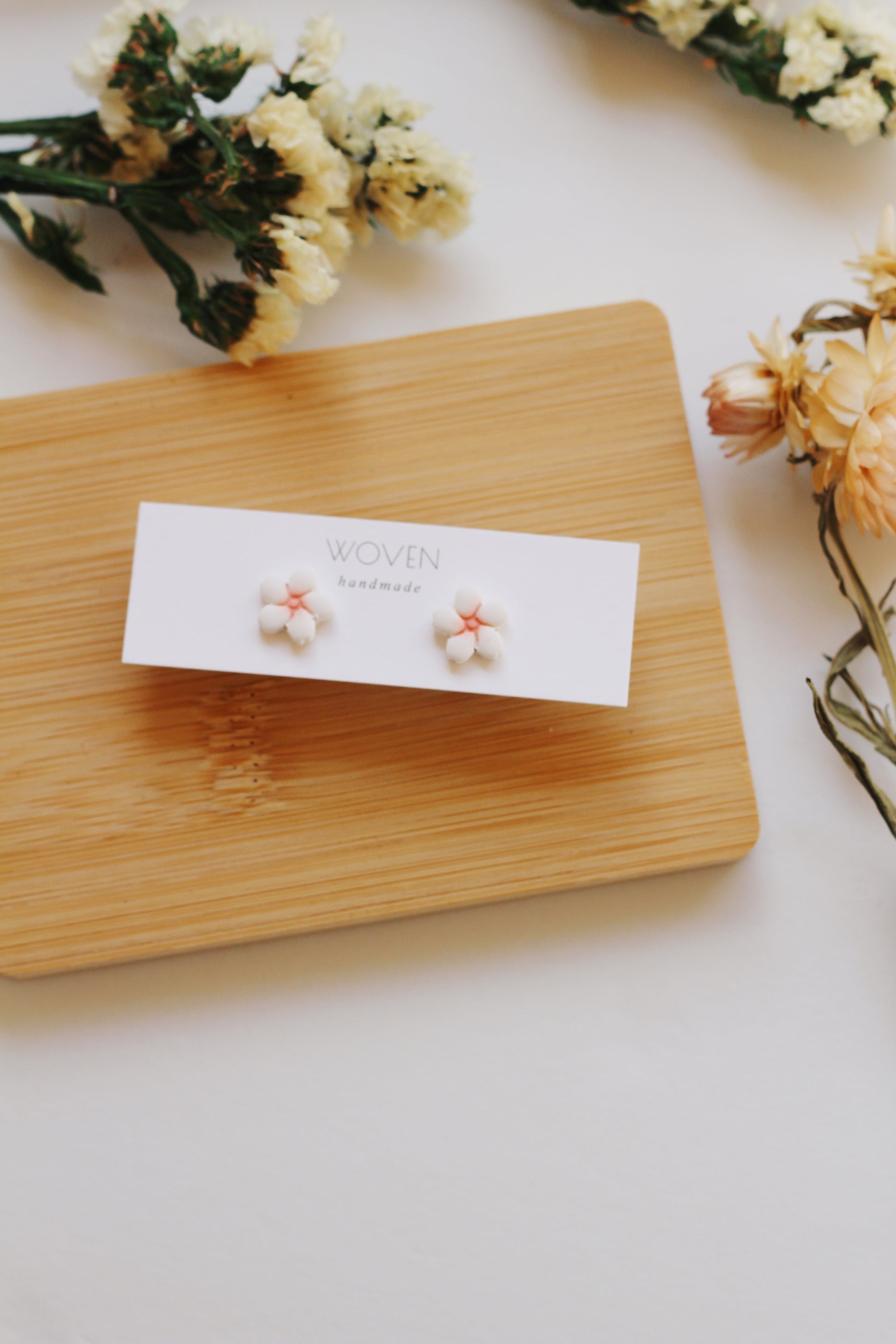 White and pink lotus flower stud earrings